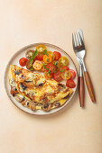 Mushroom omelette with cherry tomato salad