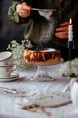 Basque cheesecake with icing sugar