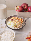 Overnight oats with yoghurt, fresh nectarine and raspberries