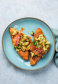 Wild garlic scrambled egg croissant with crispy bacon