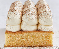 Eggnog sheet cake with cream topping