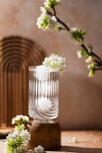 Cherry blossoms in a decorative Art Deco vase