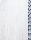 White glazed wooden background and louvre door