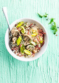 Creamy rice with bacon, mushrooms and leeks