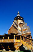 Wooden house under blue sky at Ismailowo Park, Moscow, Russia, Europe