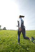 Girl jogging in nature, Girl jogging in nature, Women jogging in nature, sports wellness