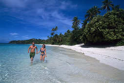 Couple on Natalau Beach, Blue Lagoon Cruise Yasawa Island, Fiji