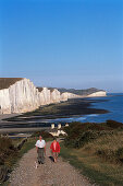 Couple and dog, Seven Sisters Cliffs, Near Seaford East Sussex, England