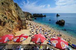 Sunshades and sandy beach, Praia do Dona Ana, Lagos, Algarve, Portugal, Europe