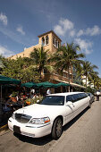Stretched limousine is passing on Ocean Drive, South Beach, Miami, Florida, USA, America