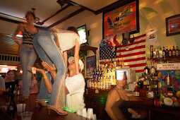 Girls are dancing on the bar while getting touched, Lagecko Bar, Duval Street Key West, Florida, USA
