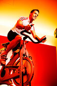 Spinning, Young man in gym on exercise bikes, Spinning, leos Sports Club Muenchen