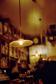 Lamps above the counter of a Tapas bar, Madrid, Spain, Europe