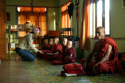 young monks sitting, Burma, Myanmar