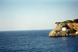 Lighthouse on shore in the sunlight, Port de Soller, Majorca, Spain, Europe