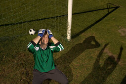 Frustrating young goalkeeper about goal against