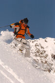 Woman skiing, doing a telemark, Stubai valley, Austria