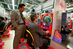 Typical Pachinko Hall with business men, Tokyo, Japan