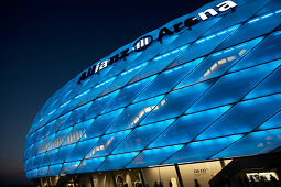 Colorful lit Allianz Arena football stadium at night, Munich, Bavaria, Germany