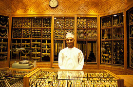 Young salesman in a shop, gold souk, Muscat, Oman, Asia