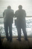 Senior couple at railing of ferry on Bosporus, Istanbul, Turkey