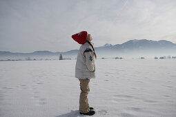 Girl 5-6 Years, standing in winter scenery, head in neck