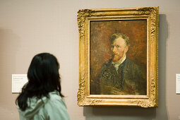 Visitor, Self Portrait, Van Gogh Museum, Woman looking at the painting Self Portrait of van Gogh, rear view, Van Gogh Museum, Amsterdam, Holland, Netherlands