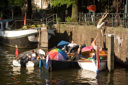 Leisure Boats, Brouwersgracht, Jordaan, People sitting in leisure boats on a sunny day, Brouwersgracht, Jordaan, Amsterdam, Holland, Netherlands