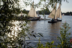 Sailing boats on lake Aussenalster, river Alster, Hamburg, Germany