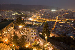 View from the Lykavittos Hill over the restaurant Orizontes to the ocean of houses of the town at night, Athens, Athens-Piraeus, Greece