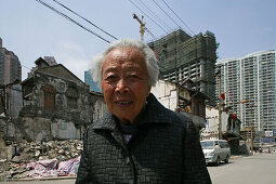 last elderly resident, demolition in old town, Lao Xi Men, Shanghai