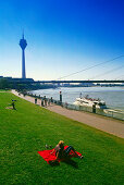 Shore of Rhine river with tower and bridge, Düsseldorf, Northrhine-Westfalen, Germany