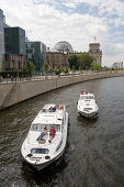 Connoisseur Houseboats Cruising Past Reichstag Parliament Building,River Spree, Berlin, Germany