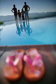 Family on poolside, Bay of Porto Vecchio, Southern  Corse, France