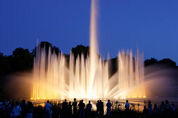 Illuminated fountain, park in the city center, district Neustadt, Hamburg, Germany