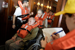 emergency drill, handycapped person, wheelchair, cruise ship MS Delphin Renaissance, Cruise Bremerhaven - South England, England