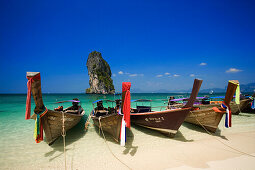 Boats anchored at beach, Ko Poda in background, Laem Phra Nang, Railay, Krabi, Thailand