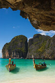 Two boats anchoring in the Maya Bay, a beautiful scenic lagoon, famous for the Hollywood film "The Beach", Ko Phi-Phi Leh, Ko Phi-Phi Islands, Krabi, Thailand, after the tsunami