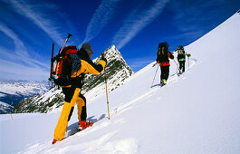 Three people on a skitour, Stubai, Tyrol, Austria