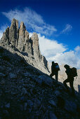 Two People on a hiking tour, Vajolett Mountain, Dolomites, South Tyrol, Italy