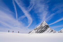 Three people on a skitour, Stubai, Tyrol, Austria