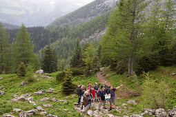 Hikers on Falzsteig hiking track, near the Watzmann Mountain, near Berchtesgaden, Berchtesgadener Land, Bavaria, Germany