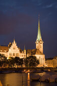 View over river Limmat to Fraumunster and St. Peter church at night, Zurich, Canton Zurich, Switzerland