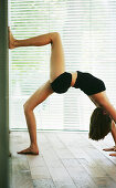 Young woman practicing yoga