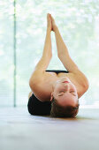 Young woman practicing yoga