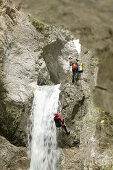 A group of people canyoning, Hachleschlucht, Haiming, Tyrol, Austria