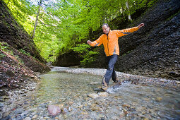 Man canyon hiking through Ofenloch, Canton St. Gallen, Switzerland, MR