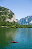 Canoes on lake Hallstatt, Hallstatt, Salzkammergut, Upper Austria, Austria