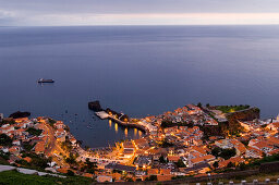 View at the houses on the coast in the evening, Camara de Lobos, Madeira, Portugal