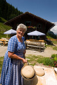 Mrs. Röck preparing bread, Amoseralm (1198 m), Dorfgastein, Gastein Valley, Salzburg, Austria